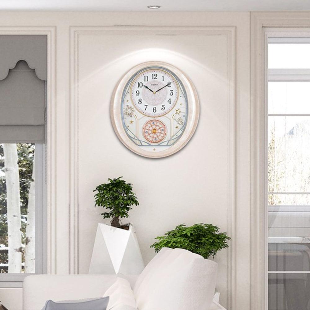 Seiko Pink Marble Melodies In Motion Musical Wall Clock QXM370P